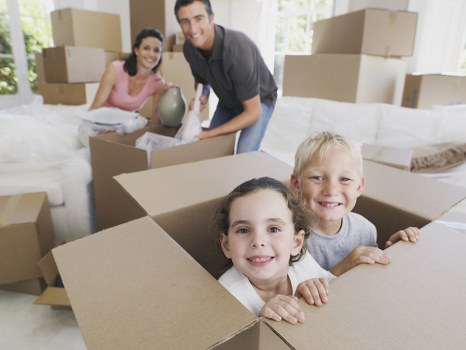 Moving van and packed boxes for a home move in Clapham