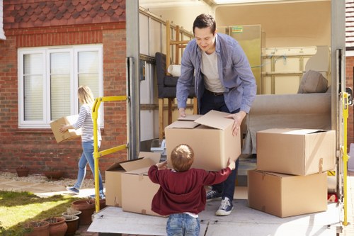 Careful loading of student belongings for a move in Clapham