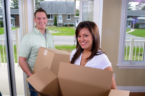 Removal van and moving team preparing a home move in Clapham