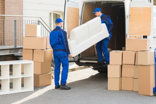 Moving equipment through a Clapham office building with care