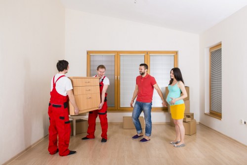 Packing and loading furniture into a van near Clapham Common
