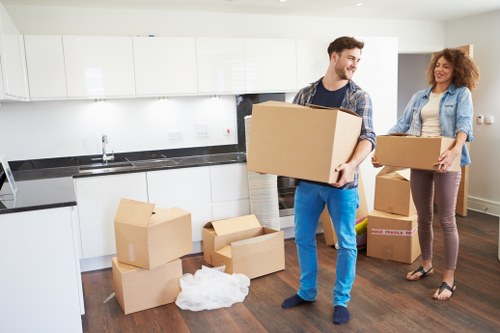 Removal crew handling furniture during a home relocation