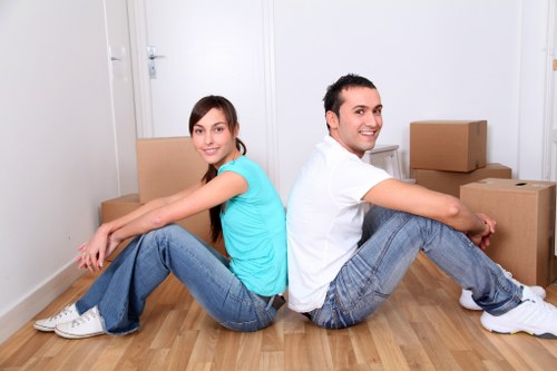Loading furniture and boxes into a moving truck in Clapham